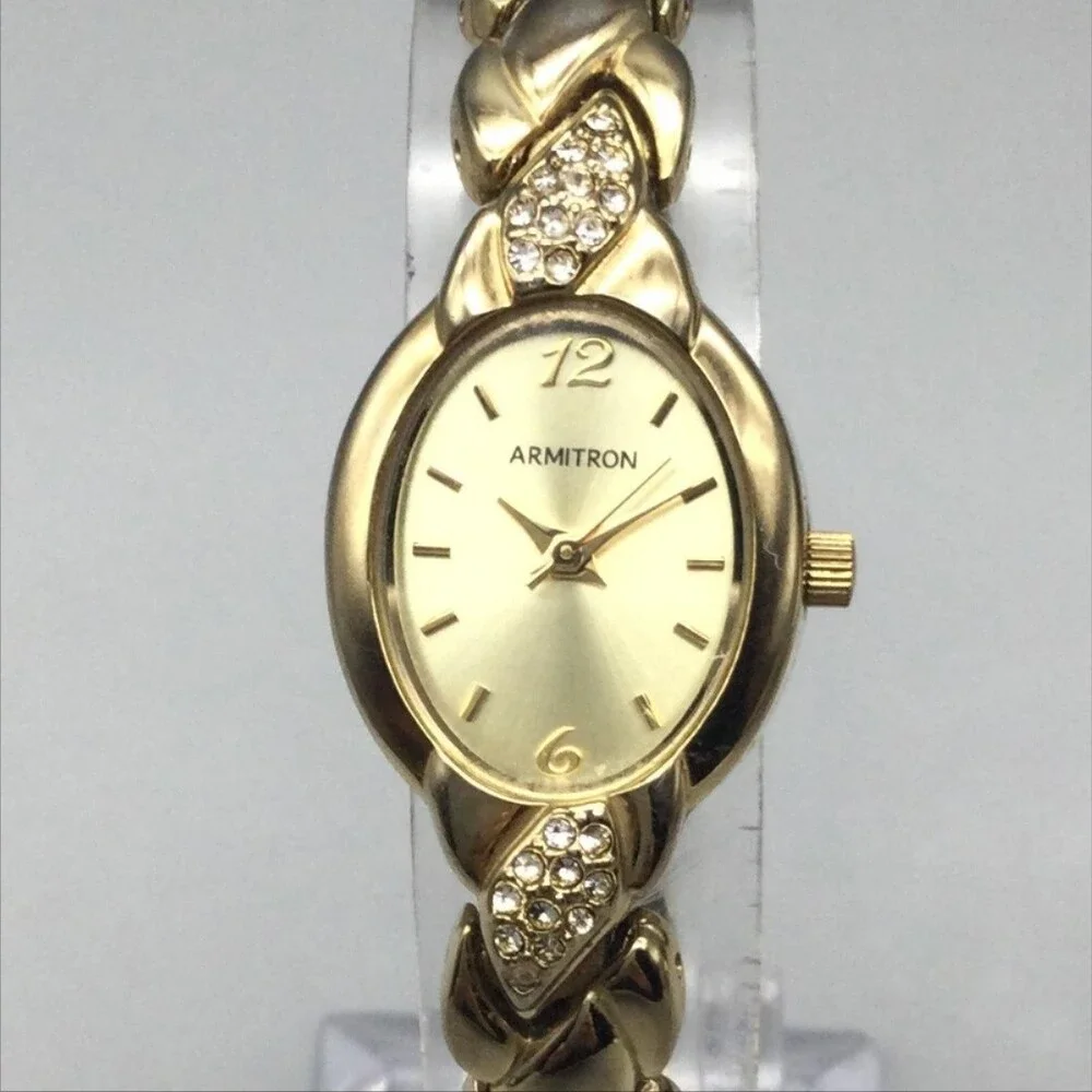 Armitron Womens Watch 19mm Gold Tone Oval Braided Bracelet New Battery 7